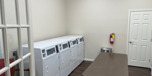 Carrollton Club Apartment Homes laundry room
