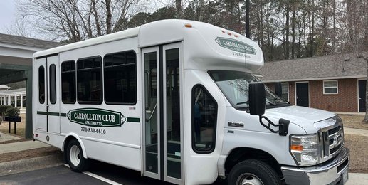 Carrollton Club apartment homes exterior Bus